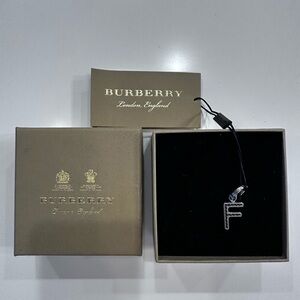 Burberry Black and Silver Initial Charm keychain.